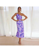 Lumina Vancouver Tiphaine floral patterned dress in orange with a flowing design, perfect for casual or semi-formal occasions.