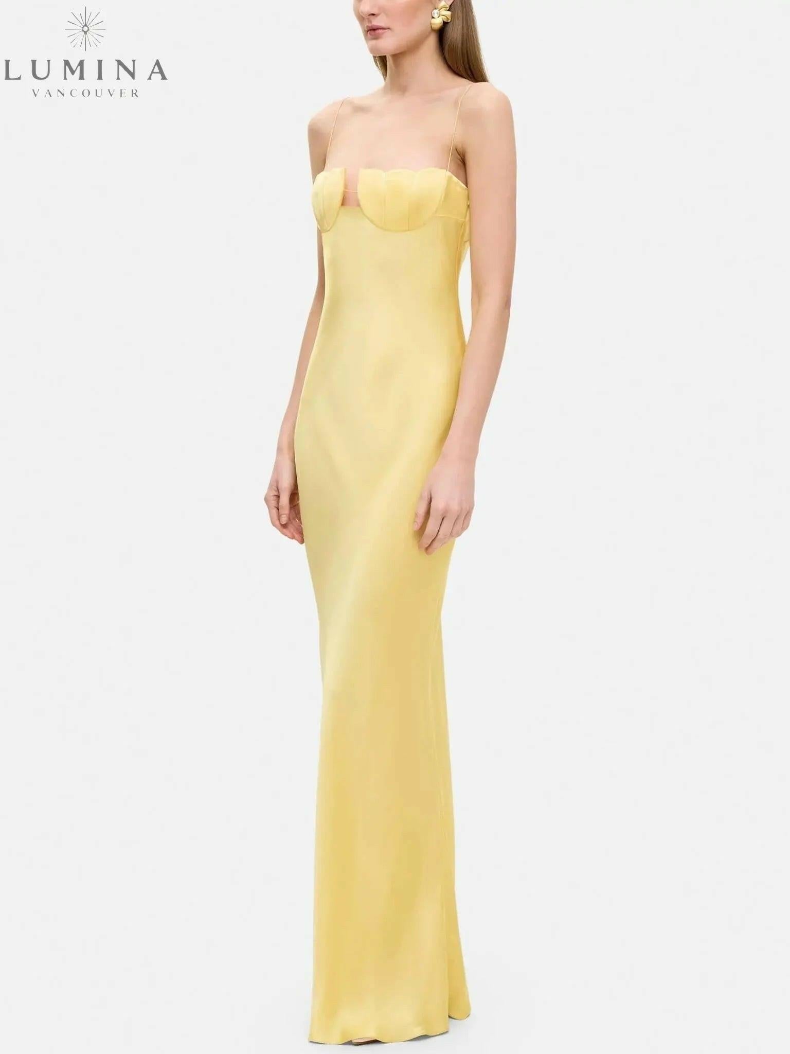 Sienna Ursule suspender maxi dress, elegant wedding guest dress by Lumina Vancouver, with flowing fabric and stylish suspender straps.