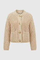 Sophia beige knit cardigan for women by Lumina Wear, featuring a cozy, relaxed fit and soft, textured fabric.