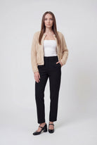 Sophia beige knit cardigan for women by Lumina Wear, featuring a relaxed fit and cozy, soft textured fabric.