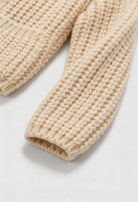 Beige knit Sophia women's cardigan by Lumina Wear featuring a cozy, relaxed fit and soft fabric for comfortable layering.