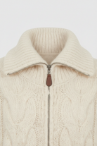 Beige long cardigan sweater with zipper detail from Lumina Wear, styled casually with a relaxed fit and cozy knit fabric.