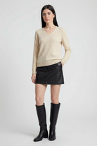 Sophia beige V-neck women's sweater by Lumina Wear, featuring a cozy fit and flattering design, displayed on a neutral background.
