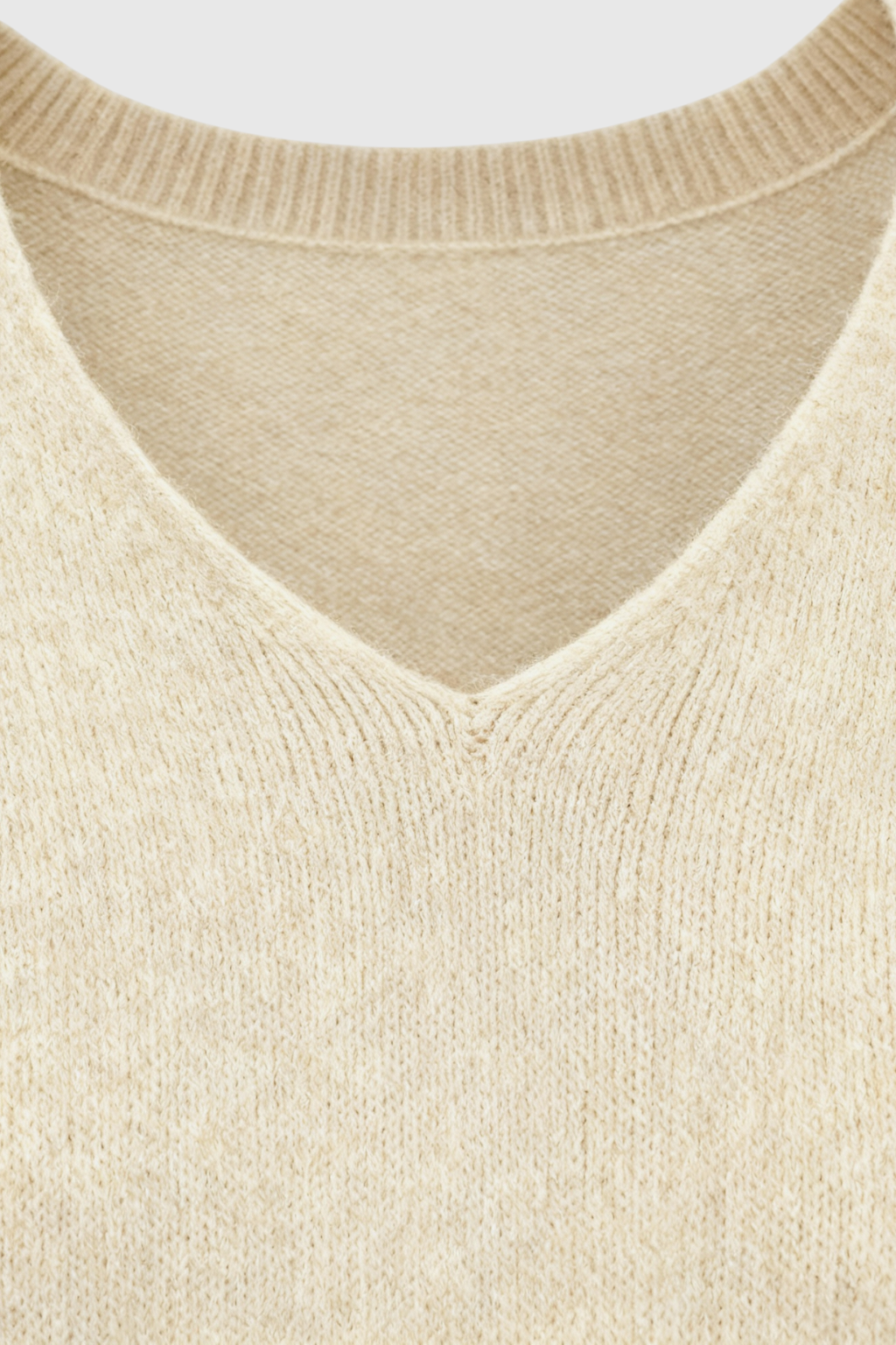 Cozy beige Lumina Wear Sophia V-neck women's sweater with a flattering fit, displayed on a plain background.