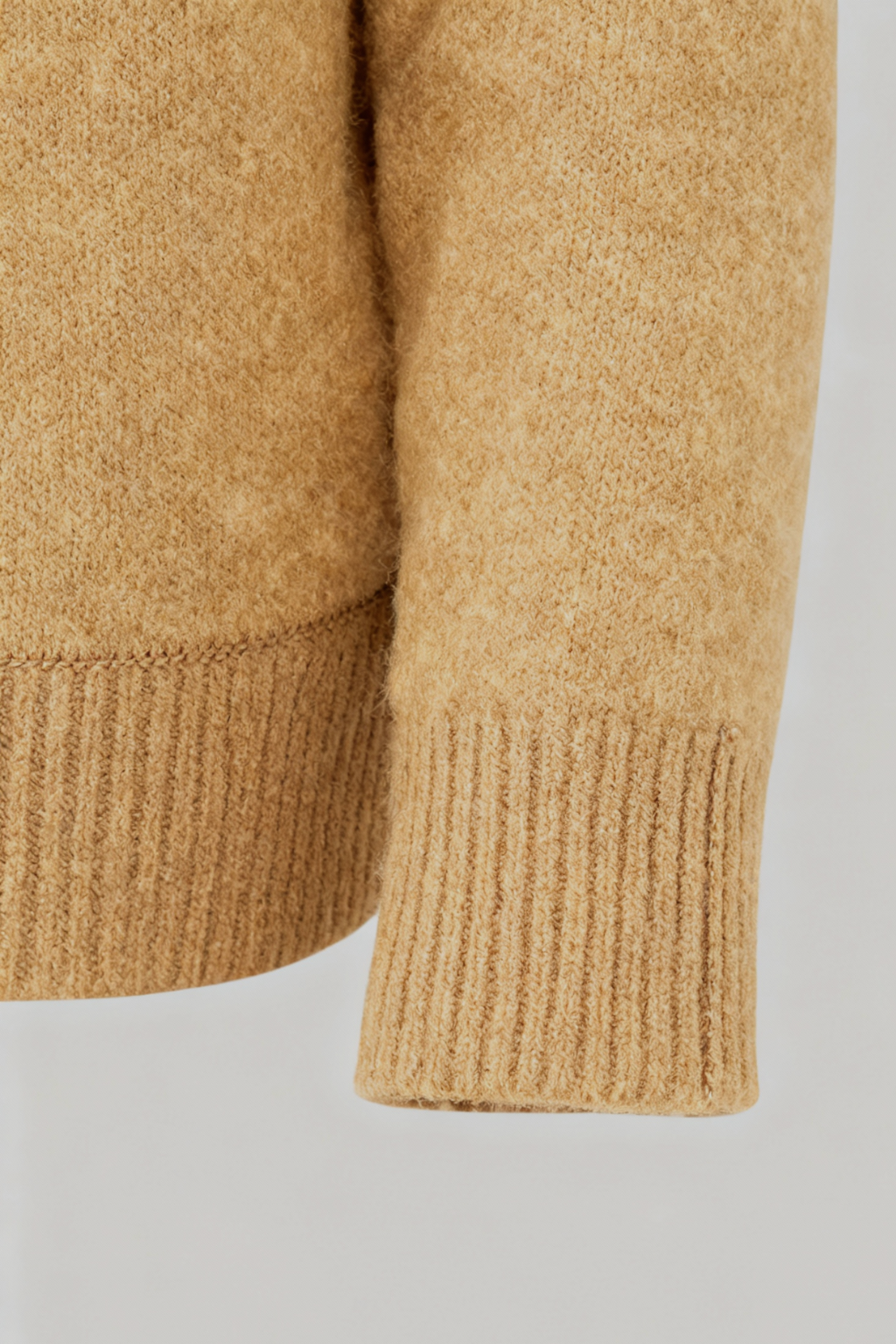 Sophia Lumina Wear cozy brown V-neck sweater with flattering fit, displayed on a mannequin.