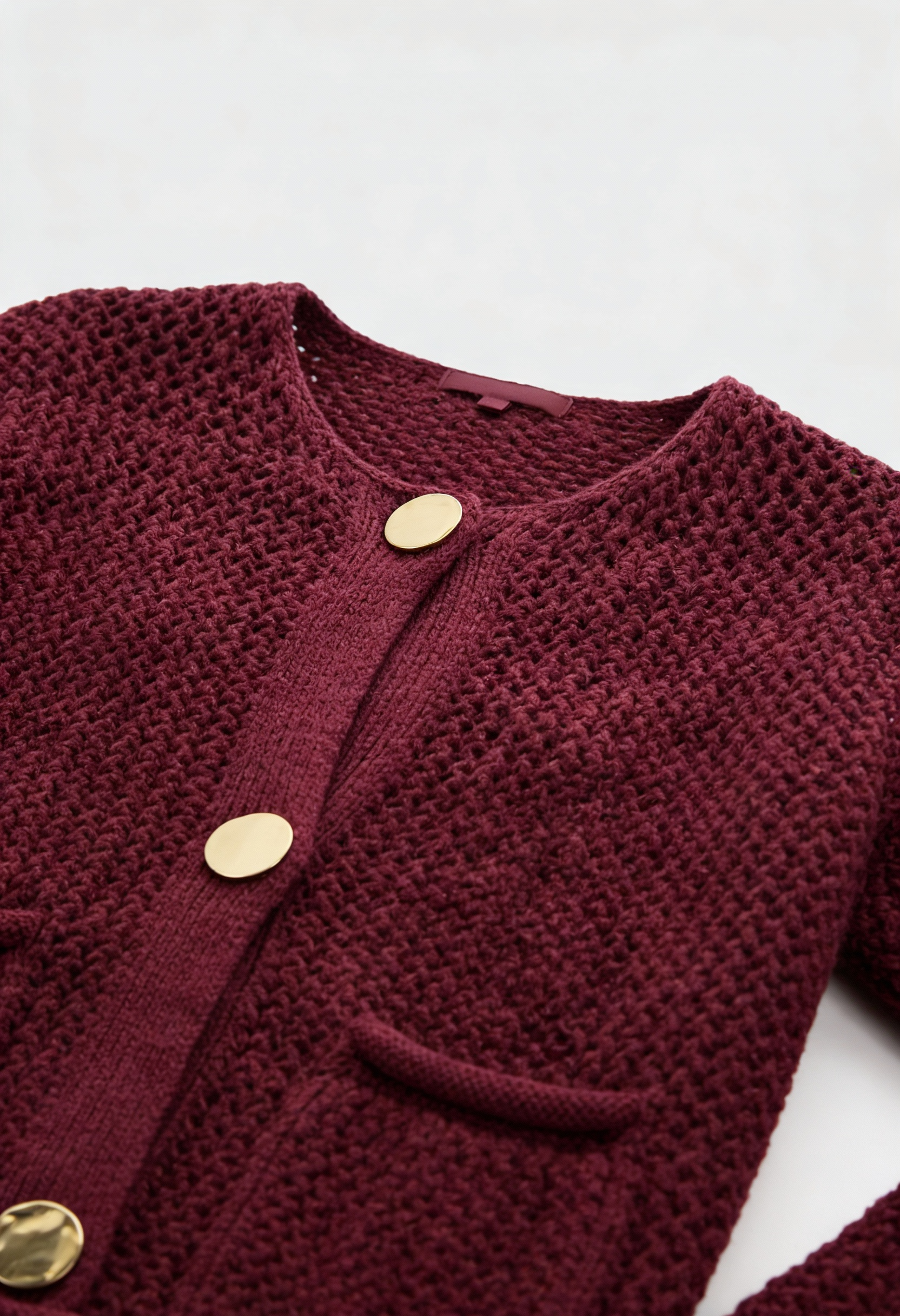 Sophia Lumina women's burgundy knit cardigan sweater with ribbed details, cozy and stylish for fall and winter wear.
