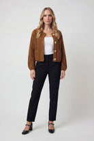 Sophia Lumina cozy long brown cardigan sweater with relaxed fit, displayed on a hanger showcasing its soft fabric and casual style.