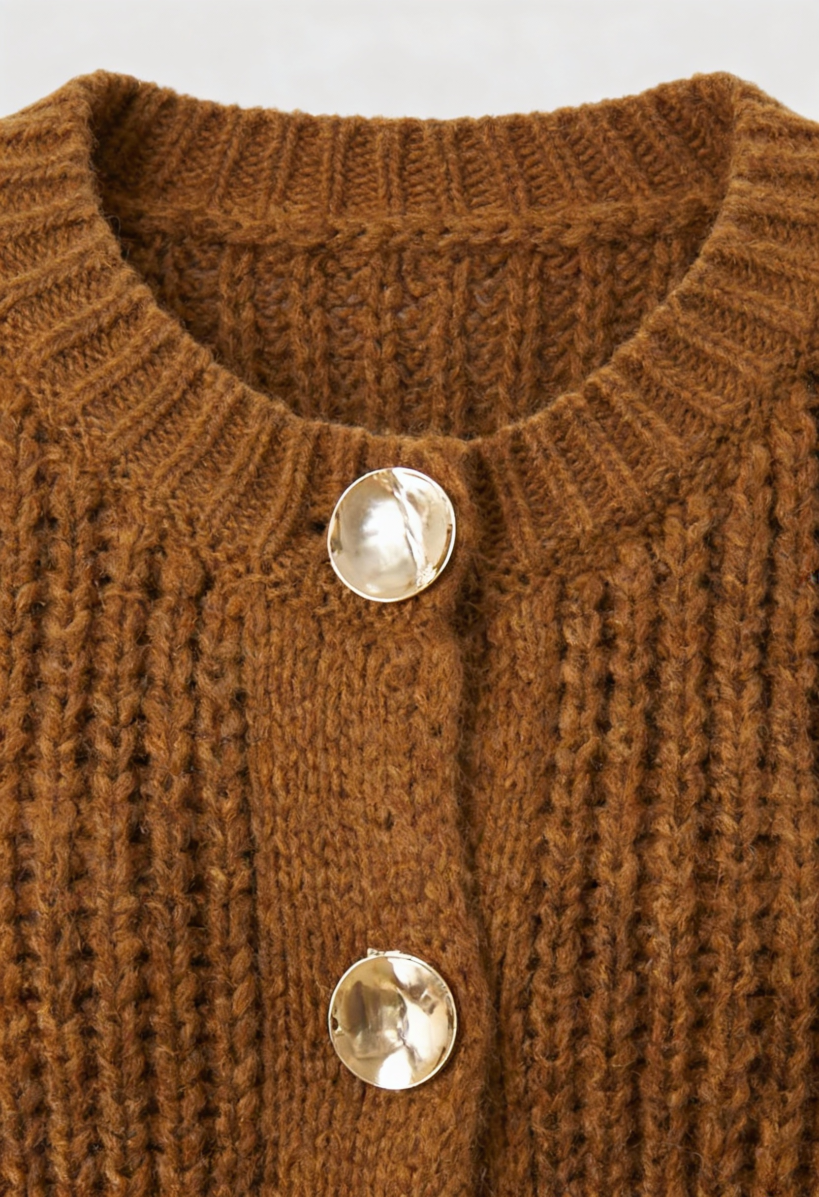 Sophia Lumina cozy long brown cardigan sweater with relaxed fit, displayed hanging with open front and ribbed cuffs.