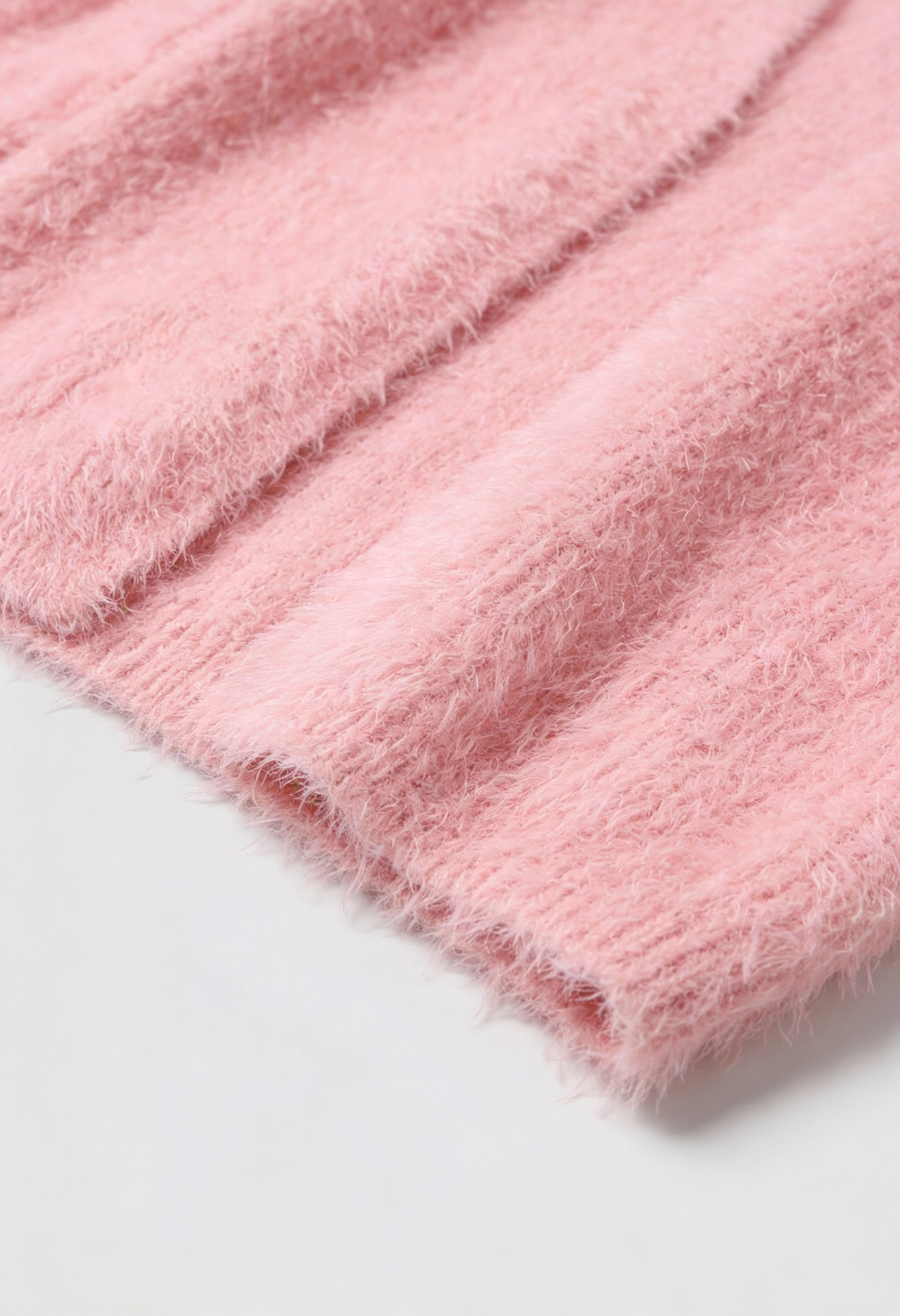 Lumina Wear Sophia pink knit cardigan with a cozy fit, perfect for versatile styling and casual wear.