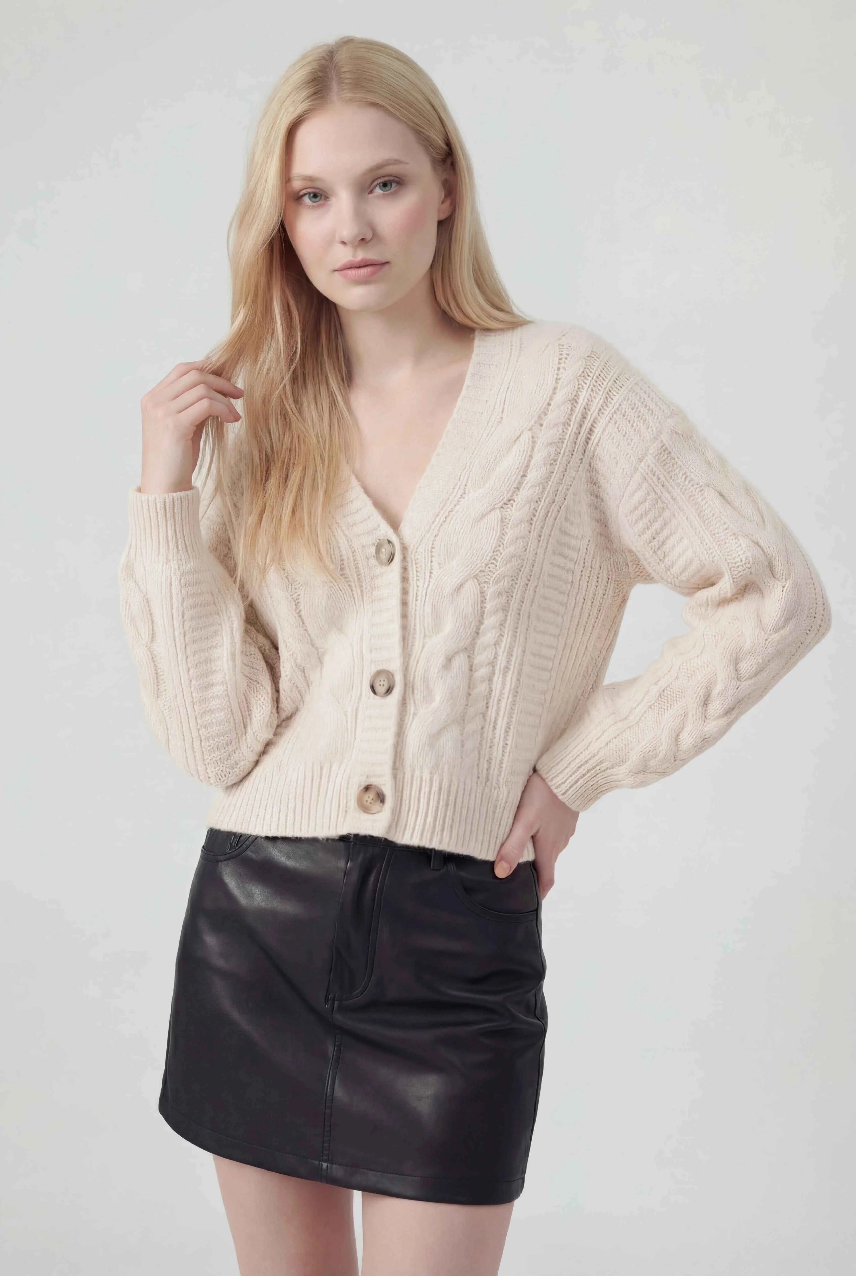 Lumina Wear Sophia white cardigan sweater with relaxed fit and ribbed hem, styled for cozy, casual wear.
