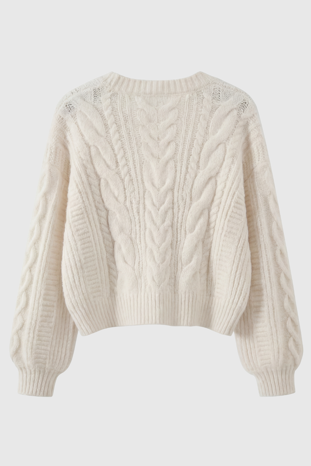 Lumina Wear Sophia white cardigan sweater with relaxed fit and ribbed hem, styled for cozy, casual wear.