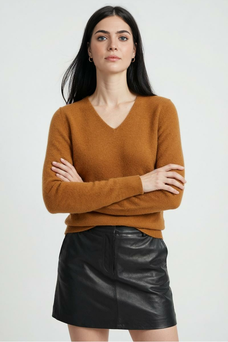 Lumina Wear Sophia cozy orange V-neck sweater with a flattering fit, featuring soft knit fabric and stylish design.