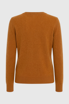 Sophia Lumina Wear cozy orange V-neck sweater with flattering fit, long sleeves, and soft knit fabric, perfect for casual wear.