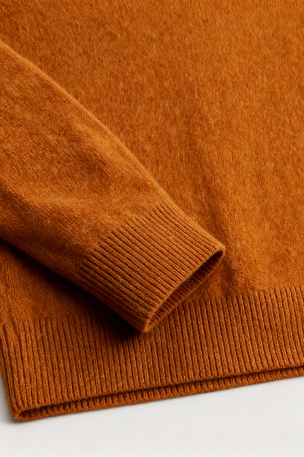 Lumina Wear Sophia cozy orange V-neck sweater with a flattering fit, featuring long sleeves and soft knit fabric.