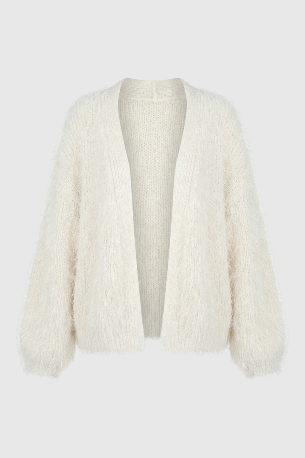 Lumina Wear Sophia cozy white knit cardigan with ribbed hem, featuring a soft, stylish sweater for a comfortable look.