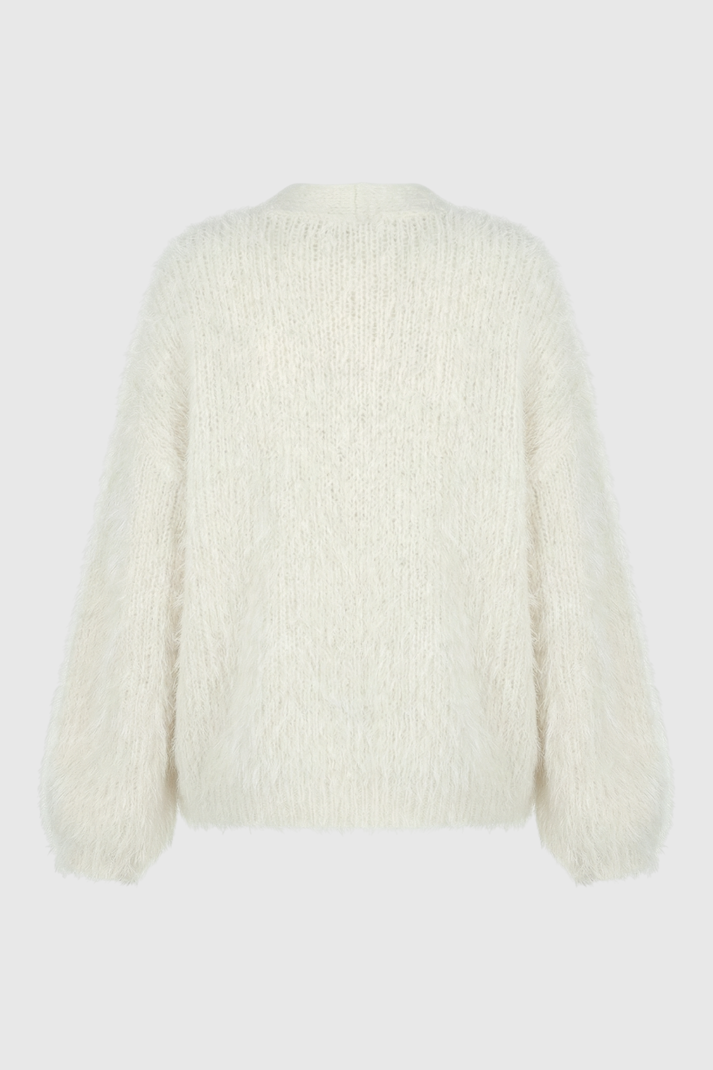 Lumina Wear Sophia cozy white knit cardigan with ribbed hem, featuring a soft, warm sweater with long sleeves and open front design.