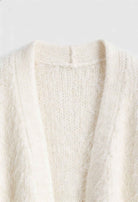 Lumina Wear Sophia cozy white knit cardigan with ribbed hem, featuring a soft, warm sweater style perfect for casual wear.