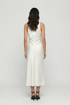Elegant beige summer dress by Lumina Wear featuring adjustable fit, casual dress style, shown in XS size.