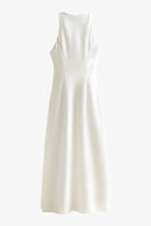 Elegant beige summer dress by Lumina Wear, featuring adjustable fit and casual style, perfect for warm weather.