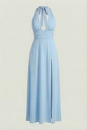 Elegant blue maxi dress by Lumina Wear featuring a backless design, flowing fabric, and a sophisticated style.
