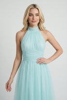 Elegant blue midi dress by Lumina Wear featuring a flattering silhouette, perfect for stylish occasions.