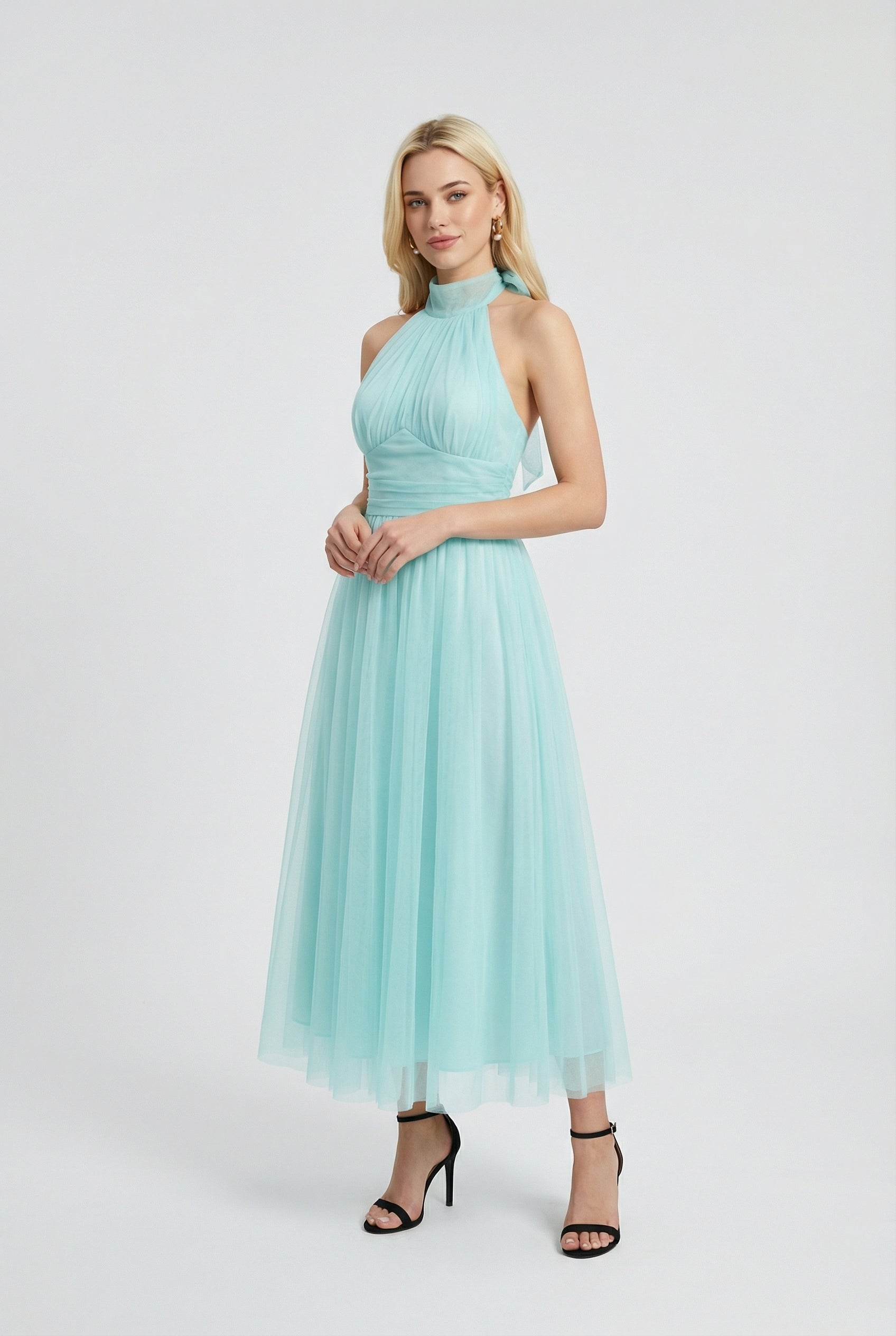 Sophia Lumina blue midi dress featuring an elegant design and flattering silhouette, perfect for stylish occasions.