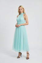 Sophia Lumina blue midi dress featuring an elegant design and flattering silhouette, perfect for stylish occasions.