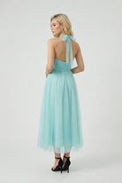 Blue Sophia midi dress by Lumina Wear featuring an elegant silhouette, perfect for stylish occasions.