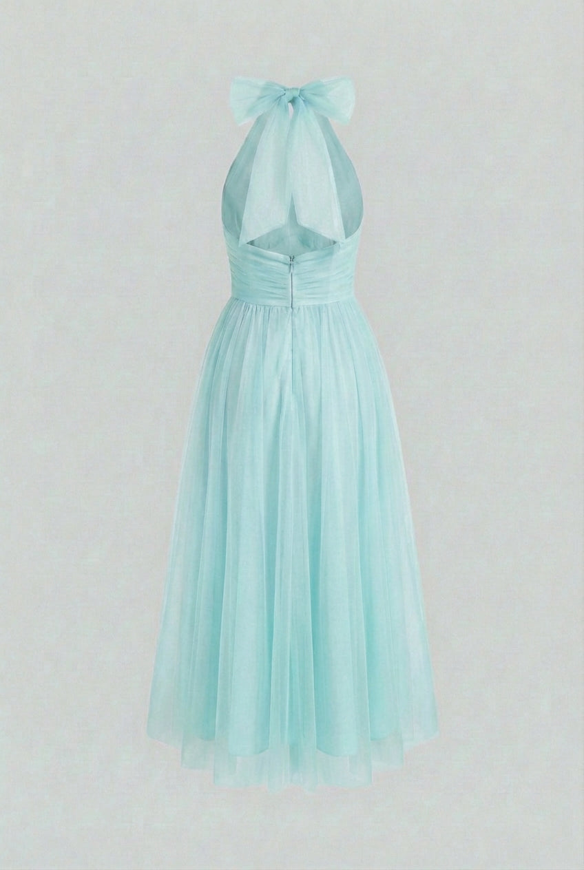Elegant blue midi dress by Lumina Wear featuring a flattering silhouette and sophisticated design.
