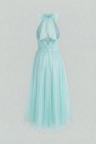 Elegant blue midi dress by Lumina Wear featuring a flattering silhouette and sophisticated design.