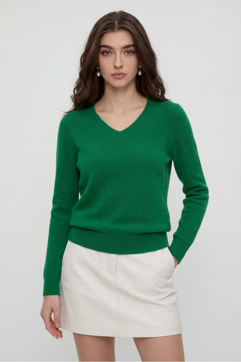 Lumina Wear Sophia green V-neck sweater with fitted silhouette, showcasing a stylish and elegant sweater on a model.