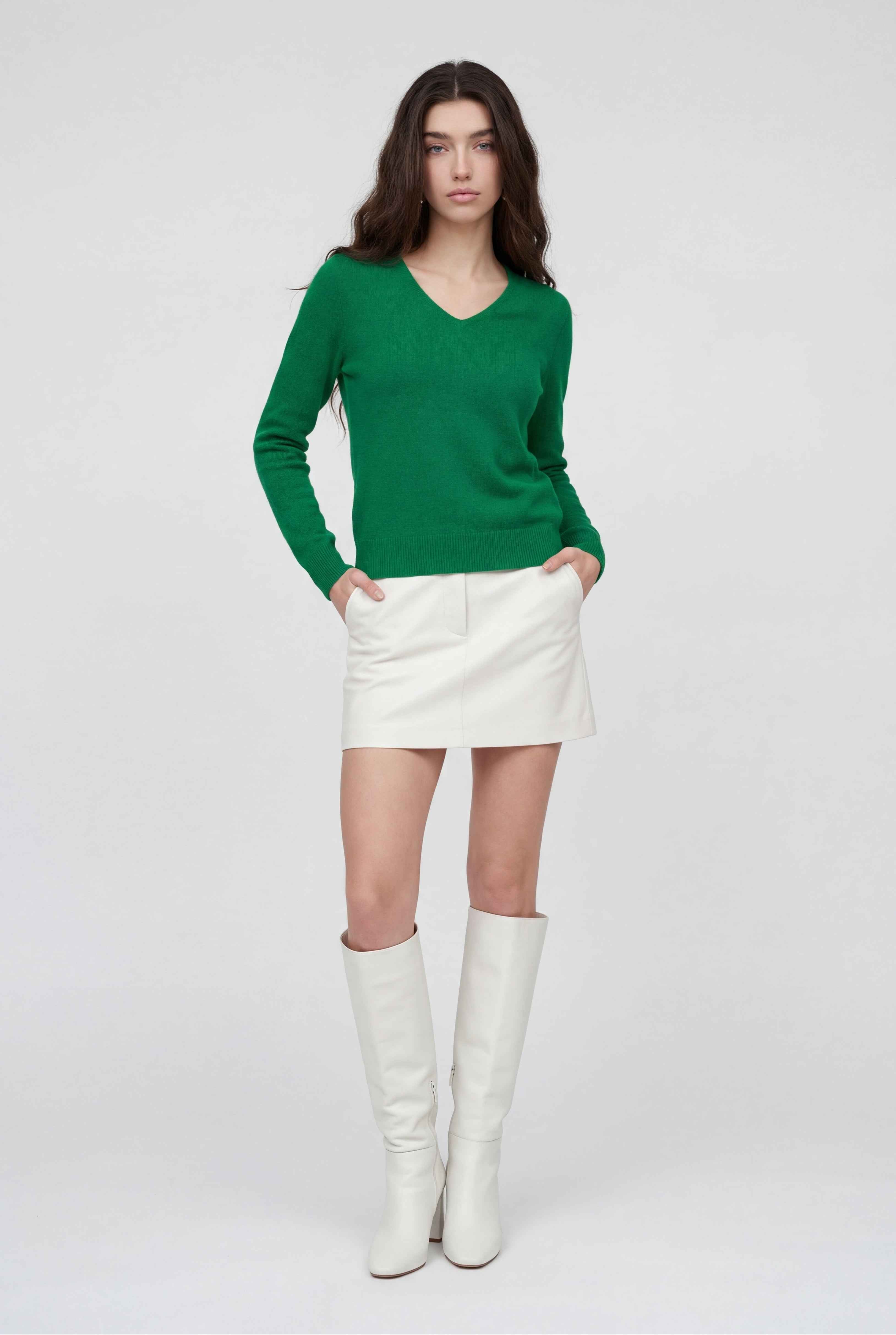 Lumina Wear Sophia green v-neck sweater with fitted silhouette, displayed on a model showcasing stylish, elegant women's knitwear.