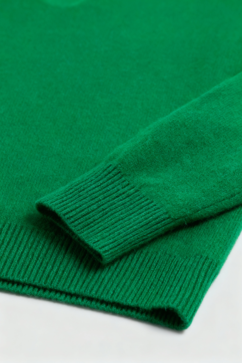 Elegant green Sophia V-neck sweater by Lumina Wear featuring a fitted silhouette, displayed on a neutral background.