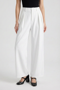 White high-waisted pleated pants with stretch from Lumina Wear, featuring a tailored fit and elegant design.