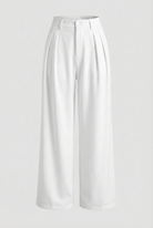 White high-waisted pleated trousers with stretch from Lumina Wear, featuring a stylish tailored fit and elegant design.