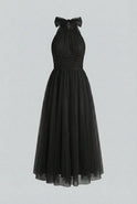 Sophia Lumina Wear elegant black long sleeve midi dress with flattering silhouette, perfect for stylish occasions.