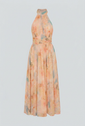 Lumina Wear Sophia elegant peach maxi dress with flattering silhouette, flowing fabric, and sleeveless design for a stylish look.