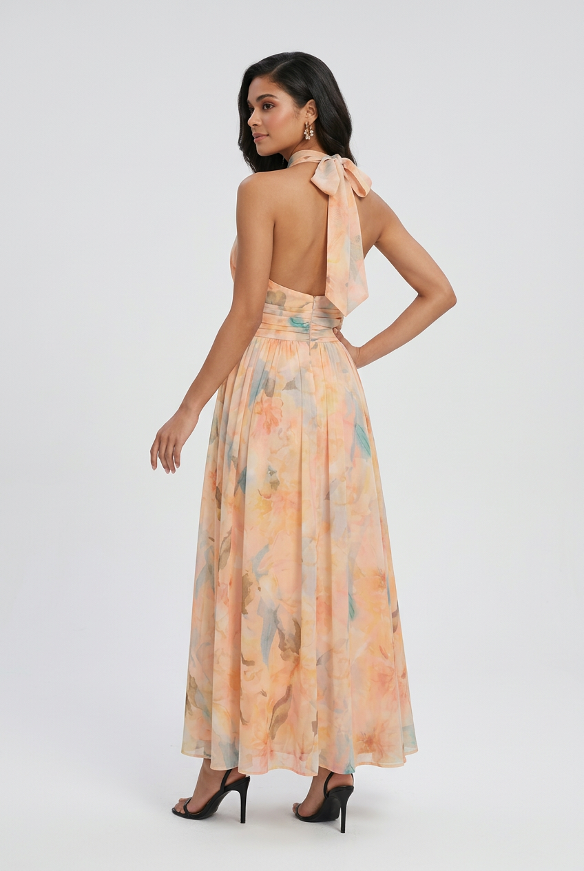 Elegant peach maxi dress by Lumina Wear featuring a flattering silhouette and flowing fabric, perfect for formal occasions.