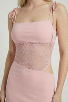 Elegant pink lace summer dress from Lumina Wear, featuring a versatile fit and casual style, perfect for warm weather.