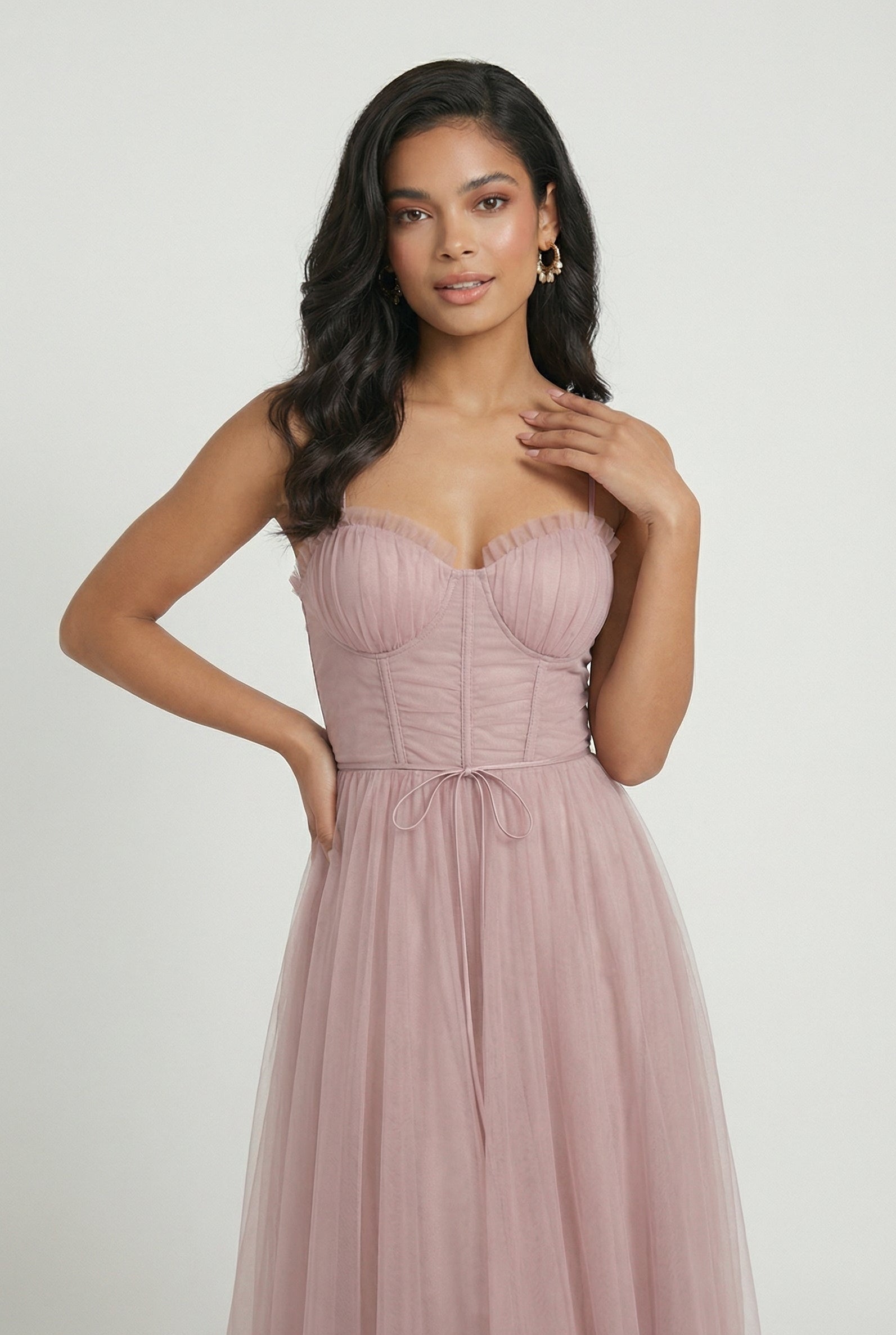 Elegant pink midi dress by Lumina Wear featuring a flattering silhouette, perfect for stylish occasions.