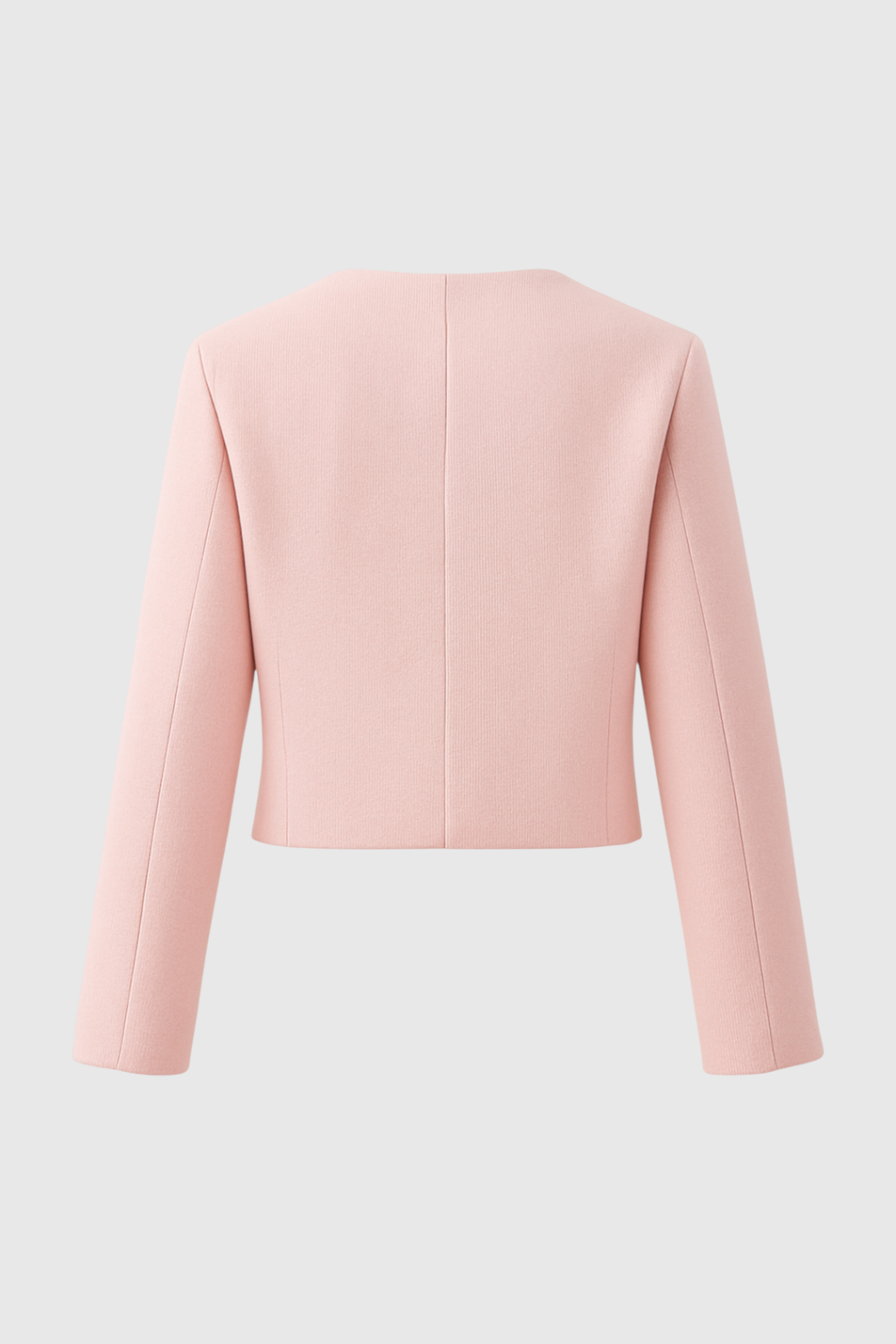 Elegant pink short jacket from Lumina Wear, featuring versatile style and tailored fit, perfect for casual or dressy outfits.