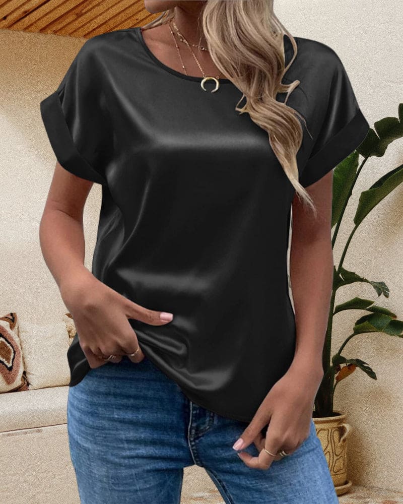 Blue Sophia satin blouse by Lumina Wear featuring a relaxed fit and short sleeves, displayed on a white background.