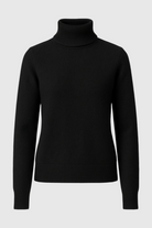 Sophia Lumina Wear slim fit black turtleneck sweater, close-up view showing smooth knit fabric and elegant design.