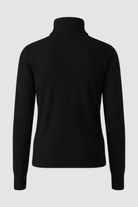 Sophia Lumina Wear slim fit black turtleneck sweater, close-up of soft knit fabric and elegant neckline.