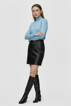 Blue Lumina Wear Sophia slim-fit turtleneck sweater, showcasing a close-up of the cozy, stylish design and ribbed collar.