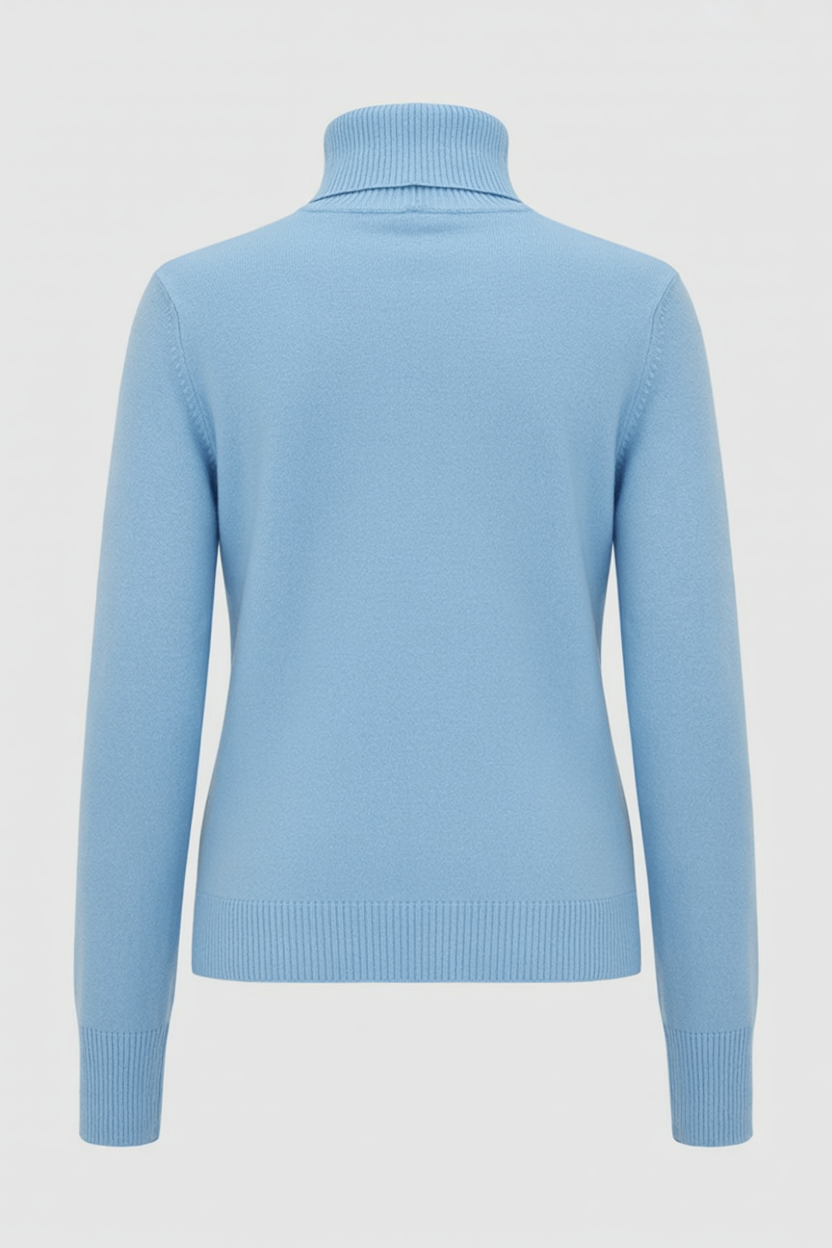 Blue Sophia Lumina Wear slim fit turtleneck sweater, showing its cozy knit and fitted design in a close-up shot.