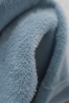 Blue Lumina Wear Sophia slim fit turtleneck sweater, showcasing a cozy, stylish design with a fitted silhouette and ribbed collar.