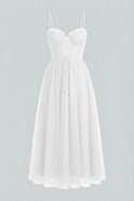 Elegant white Sophia midi dress by Lumina Wear featuring a flattering silhouette and sophisticated design.