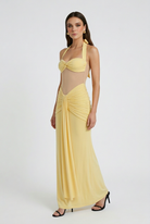 Elegant yellow Halter dress with ruched detail from Lumina Wear, featuring a flattering fit and stylish design.