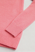 Pink Lumina Wear Sophia V-Neck Knit Sweater with long sleeves, flattering design and cozy knit texture.